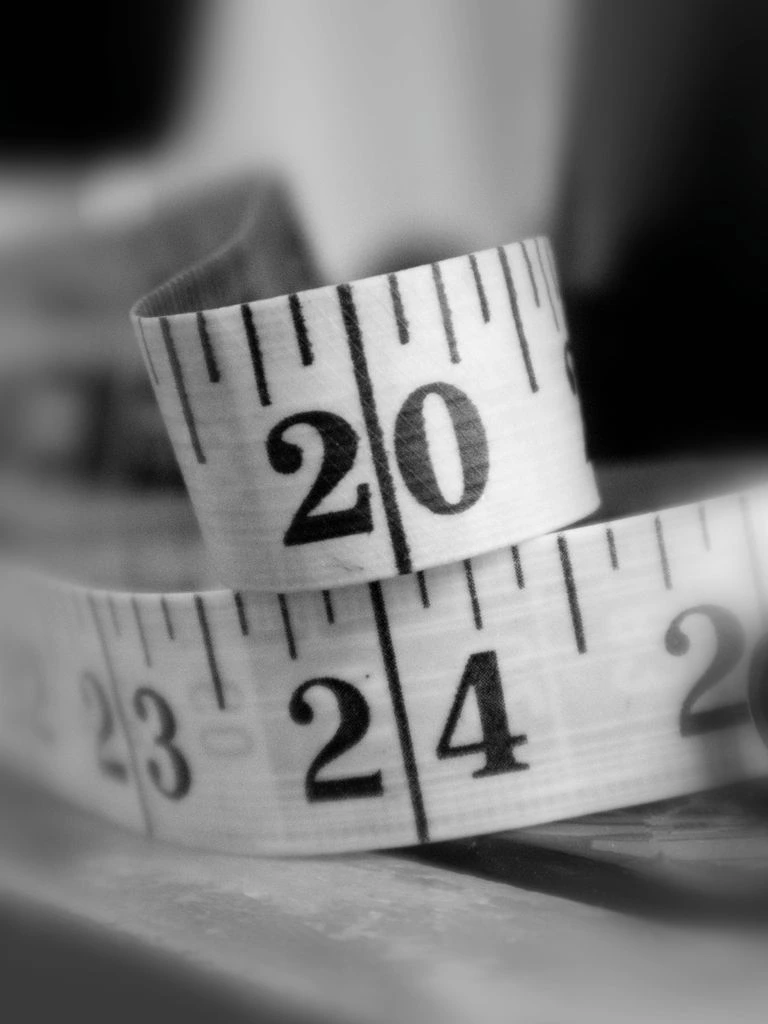 A hand-stitched numbered label — No. 127 of 180.